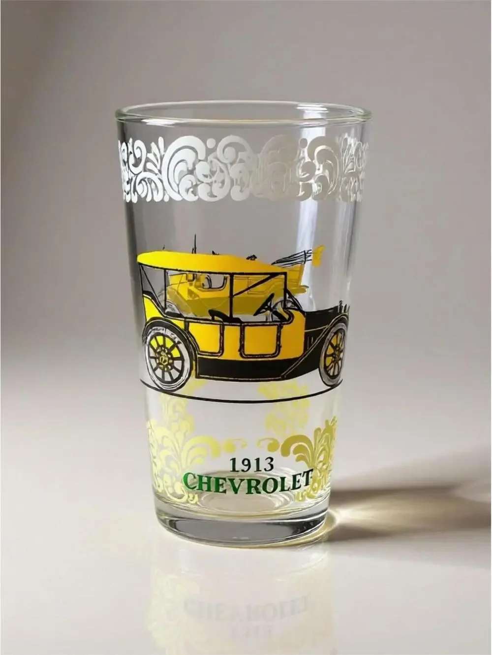 Vintage glass tumblers with early automobile designs 3